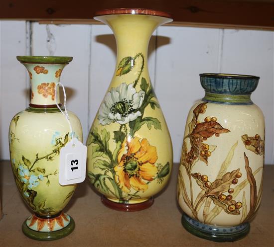 Doulton Lambeth yellow-ground vase decorated poppies and two similar vases